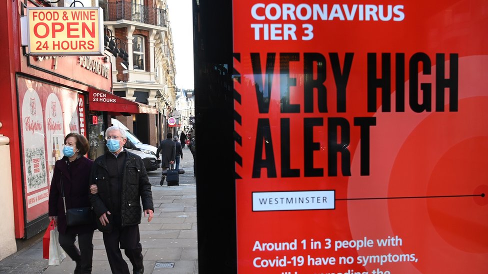 Shoppers in London on 17 December 2020