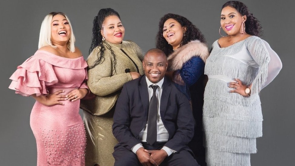 Musa Mseleku surrounded by his four wives