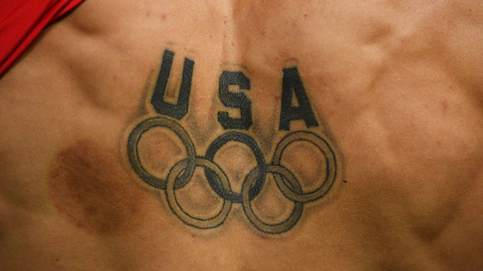 Деталь татуировки Сэмюэля Микулака из США после финала мужского индивидуального многоборья в пятый день Олимпийских игр в Рио-де-Жанейро в Рио-де-Жанейро, Бразилия, 10 августа 2016 года.