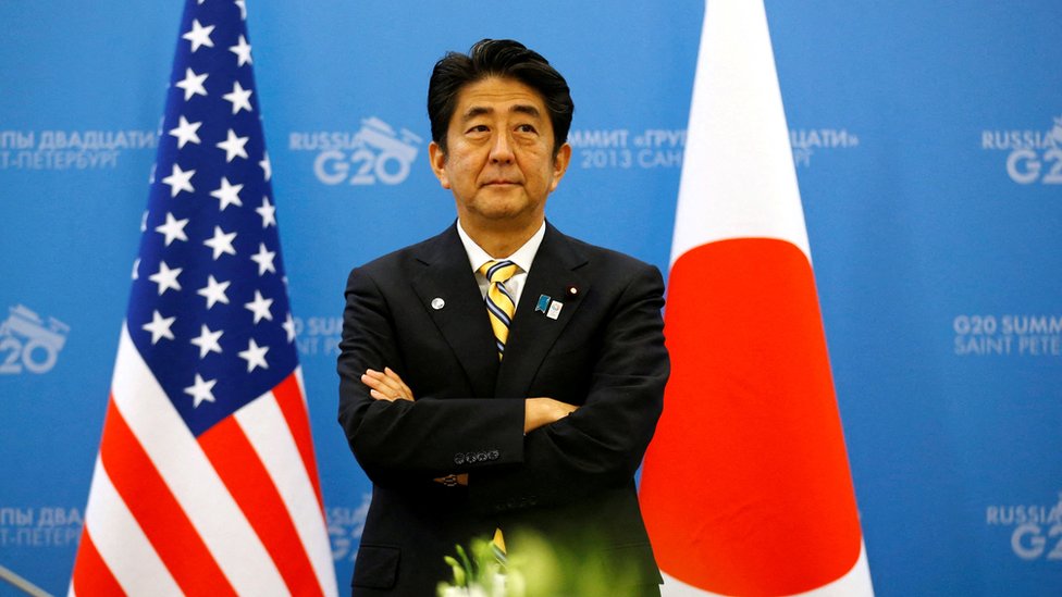 Japanese PM Abe waits for U.S. President Obama to arrive for their meeting at the G20 Summit in St. Petersburg