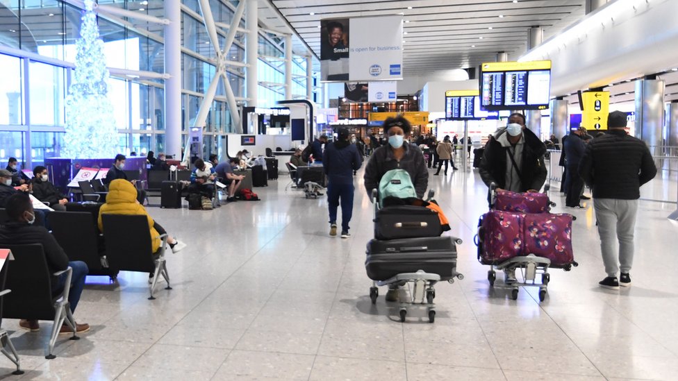 Passengers at Heathrow Airport