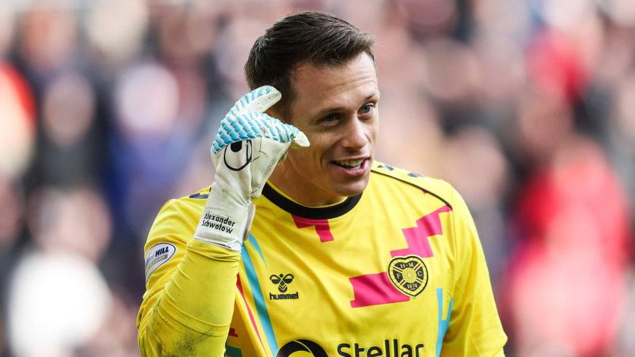 Hearts sign goalkeeper Reus as Schwolow departs - BBC Sport Hearts sign goalkeeper Reus as Schwolow departs - BBC Sport