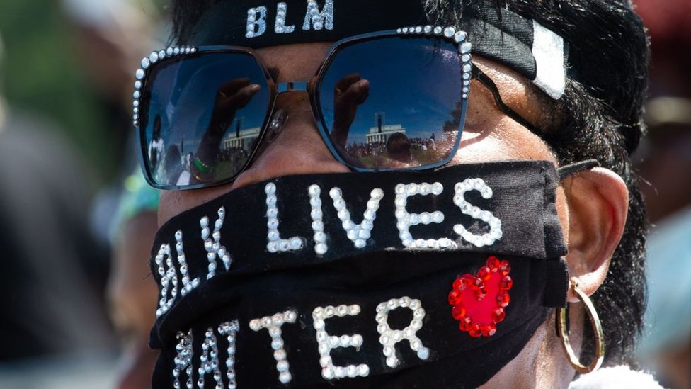 A woman wears a Black Lives Matter mask at the 2020 March On Washington