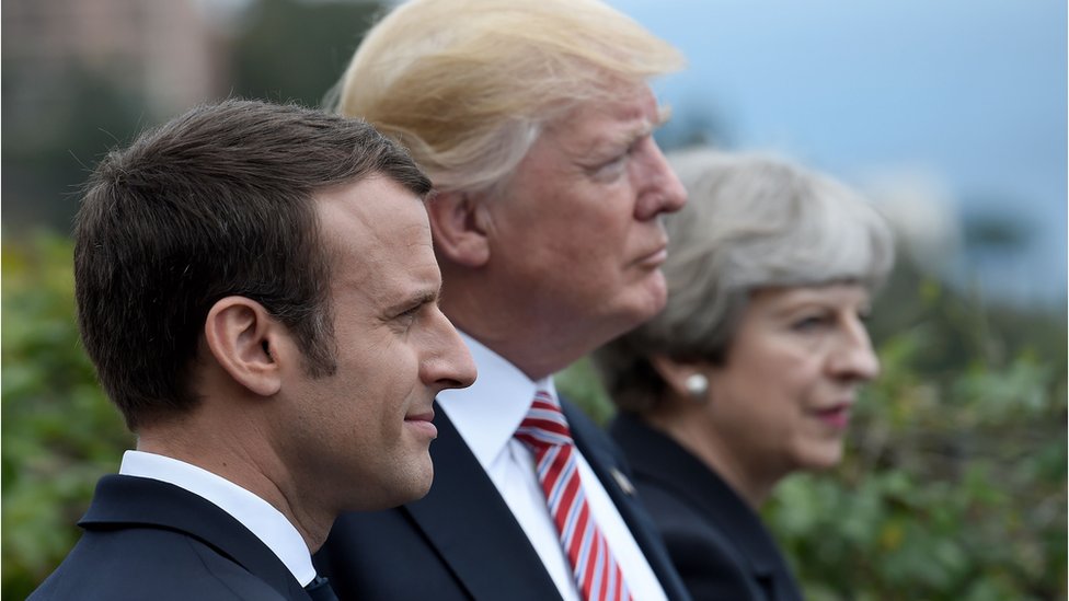 El presidente francés, Emmanuel Macron, el presidente de EE.UU., Donald Trump, y la primera ministra británica, Theresa May.