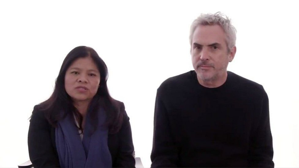 El director mexicano Alfonso Cuarón junto a Marcelina Bautista