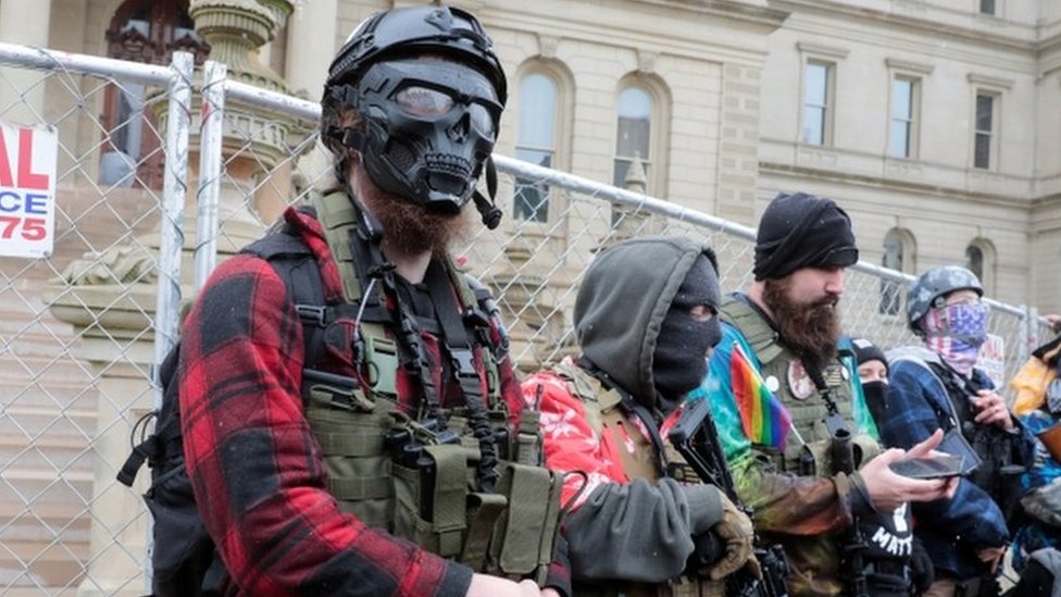 Members of the Boogaloo Bois protest against the election of President-elect Joe Biden, outside the Michigan State Capitol in Lansing, Michigan