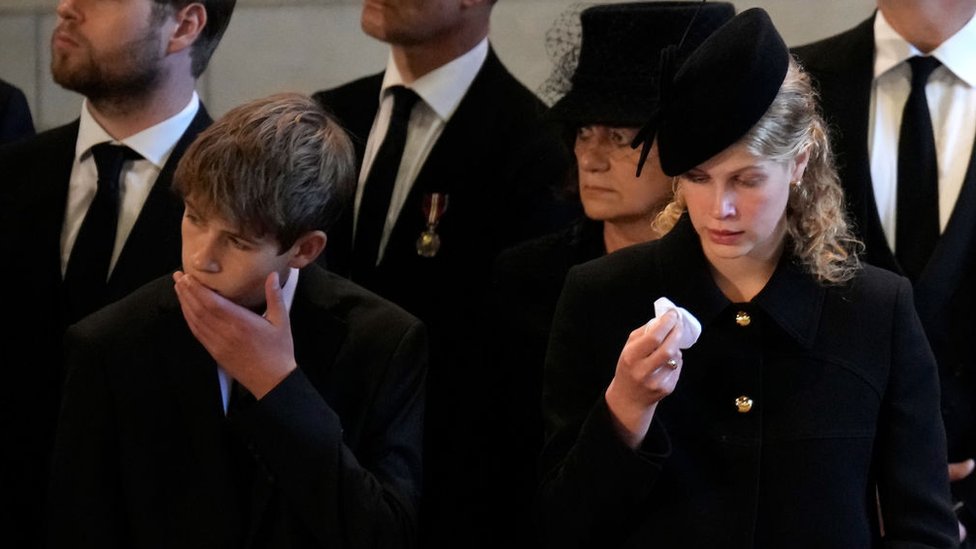 James, Viscount Severn, and Lady Louise Windsor pay their respects in The Palace of Westminster after the procession for the Lying-in State of Queen Elizabeth II