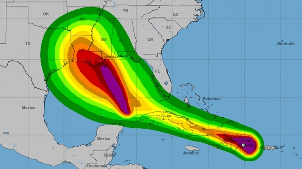 Thousands evacuated as two storms head for southern US