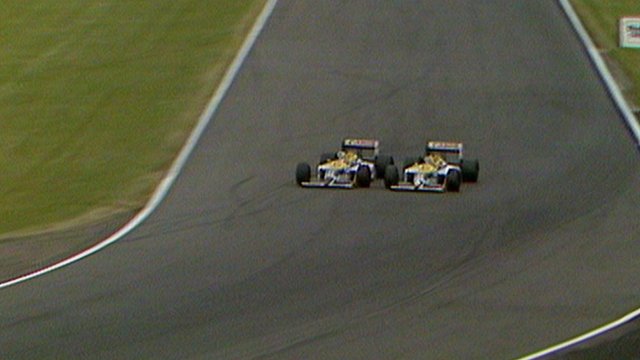Nigel Mansell passes Nelson Piquet