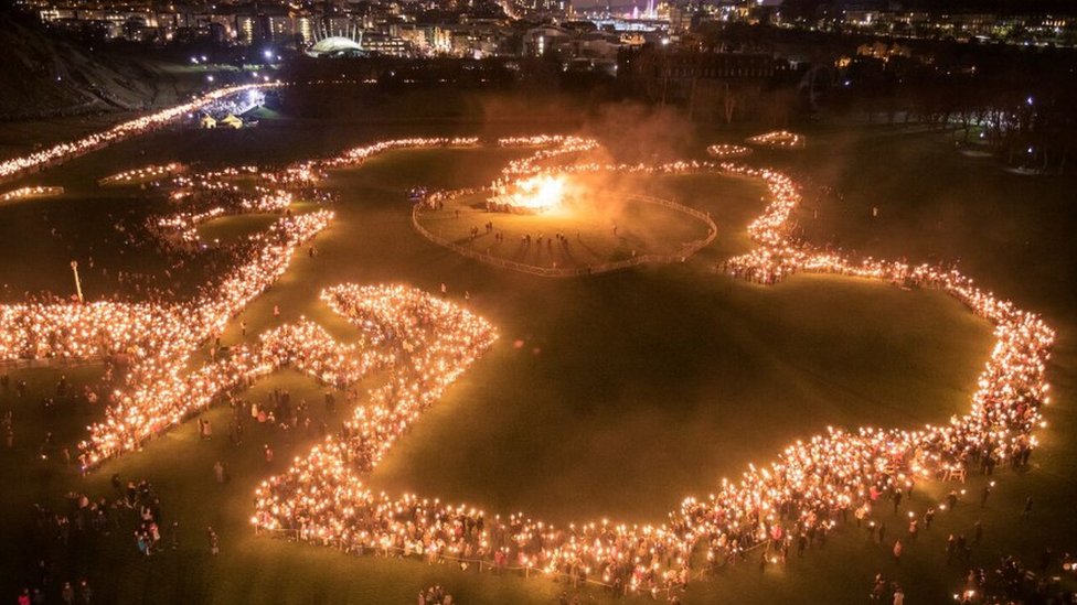 Edinburgh torchlight procession creates giant Scotland map