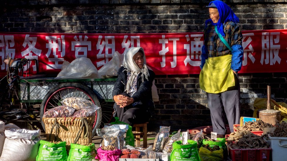 Lokalna prodavačica na pijaci u provinciji Junan