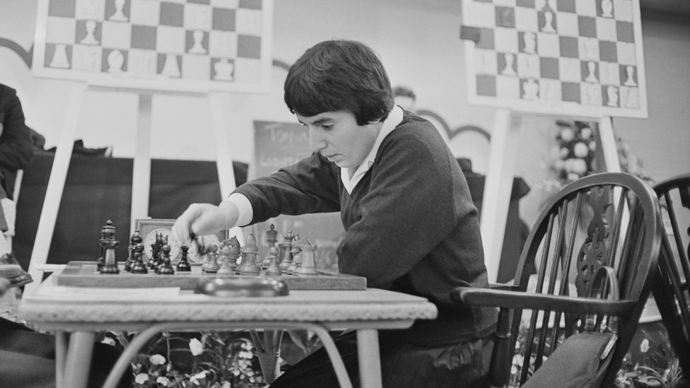 Nona Gaprindashvili plays a game of chess at the International Chess Congress in London on 30 December 1964