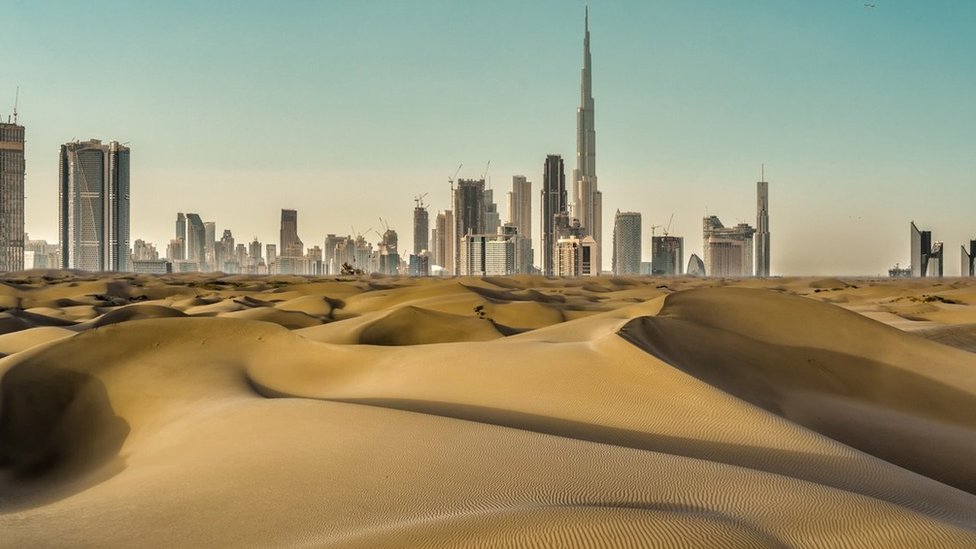 Dubai cityscape with desert in front