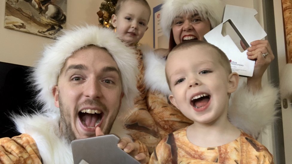 On a roll: LadBaby is again joined by his wife Roxanne and their children on his latest festive hit