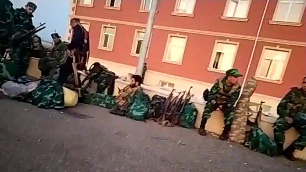 Syrian mercenaries on strike outside their barracks in Azerbaijan