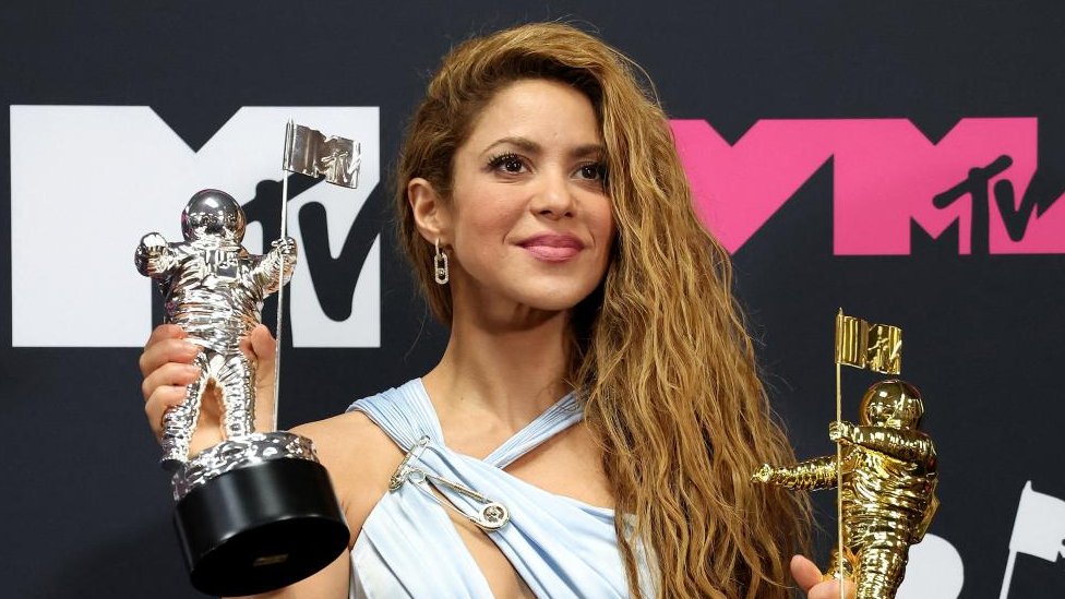 Shakira poses with her Video Vanguard Award and her Karol G's Best Collaboration Award in September 2023.
