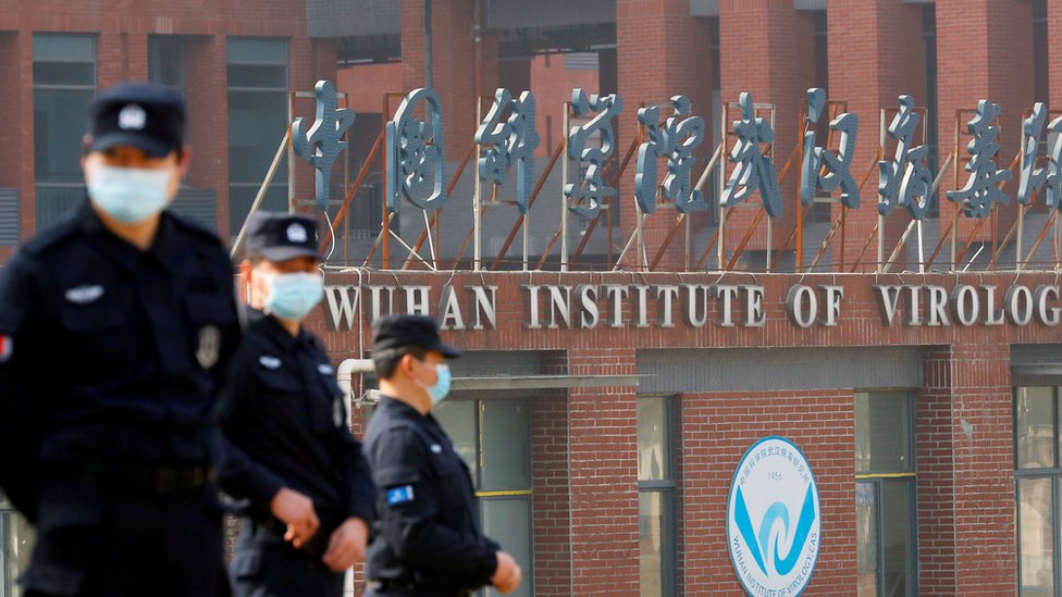 Security personnel outside the Wuhan Institute of Virology during the visit by WHO team, Feb 2021