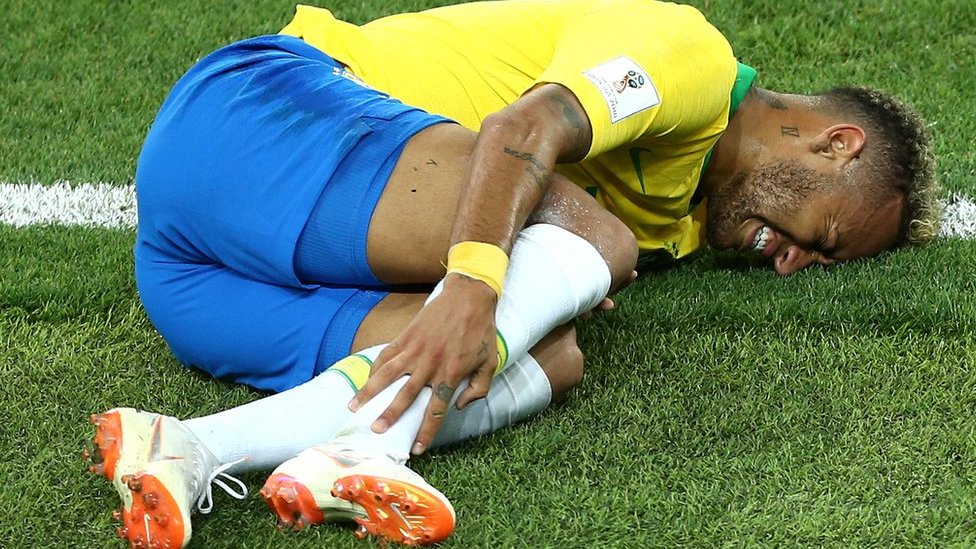 Neymar removed his footwear to display a heavily swollen right ankle after being substituted near the end of Brazil's win over Serbia