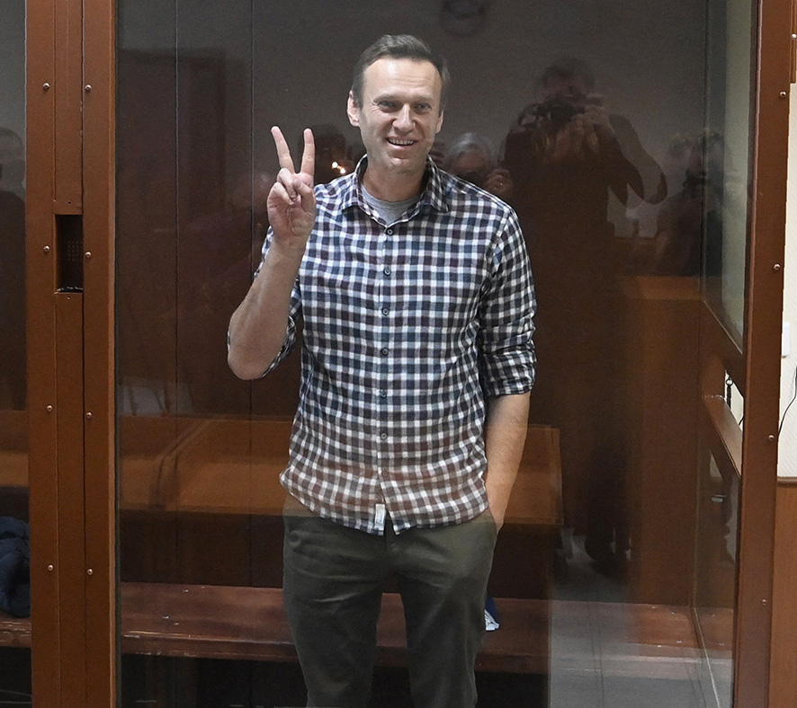 Alexei Navalny stands inside a glass cell during a court hearing at the Babushkinsky district court in Moscow - 20 February 2021