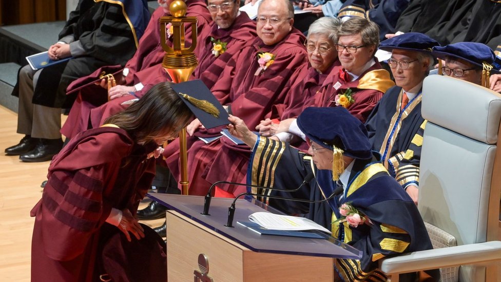 Oscar-winning actress Michelle Yeoh Choo Kheng (L) receives an honorary doctoral degree in humanities from Hong Kong University of Science and Technology on November 17, 2023 in Hong Kong, China.