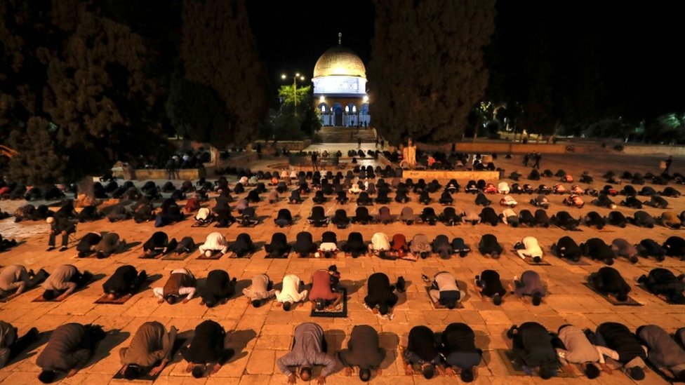 Palestinians perform the dawn prayer inside the Al-Aqsa mosque compound, Islam`s third holiest site, in Jerusalem`s Old City