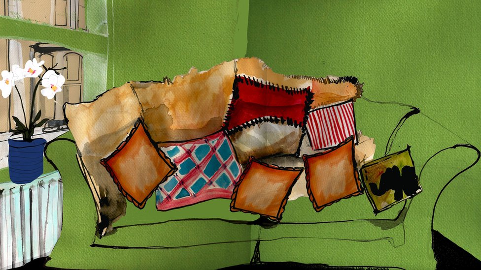 Illustration of cushions on a green sofa