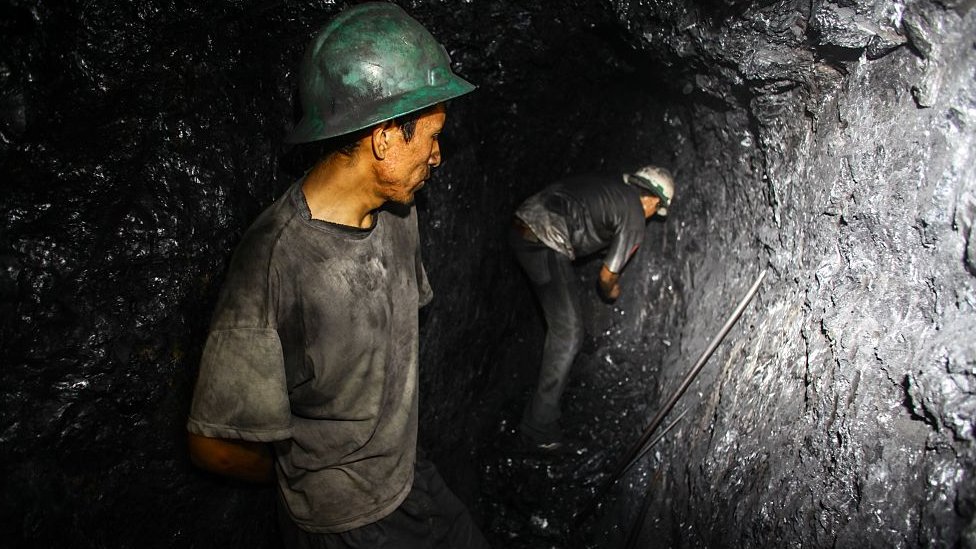 Mineros en Perú.