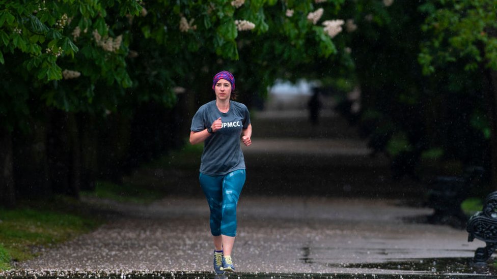 Jogger running along