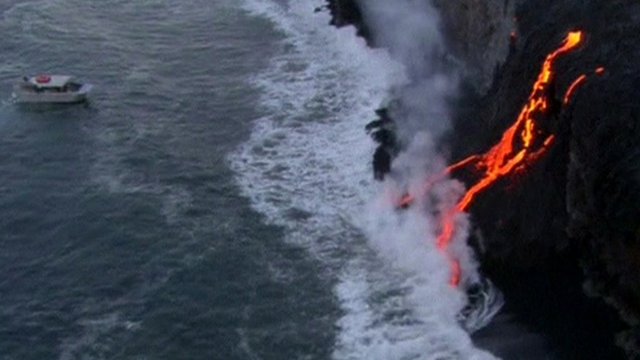 Lava spills into ocean