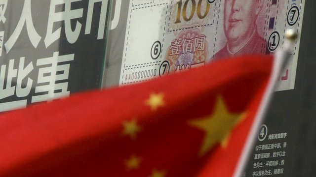 Chinese flag in front of bank note