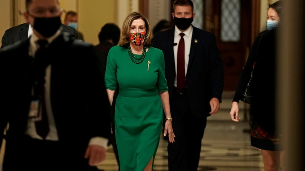 Nancy Pelosi (C) - 24 December