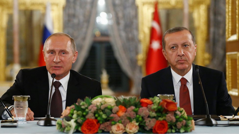 Russian President Putin talks during a joint news conference with his Turkish counterpart Erdogan