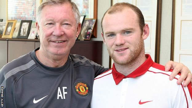 Sir Alex Ferguson and Wayne Rooney embrace, 2010.
