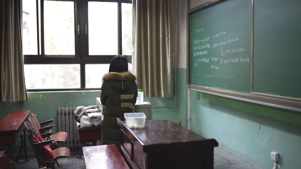 This picture taken on January 17, 2018 shows a female student in a classroom at Beihang University in Beijing.