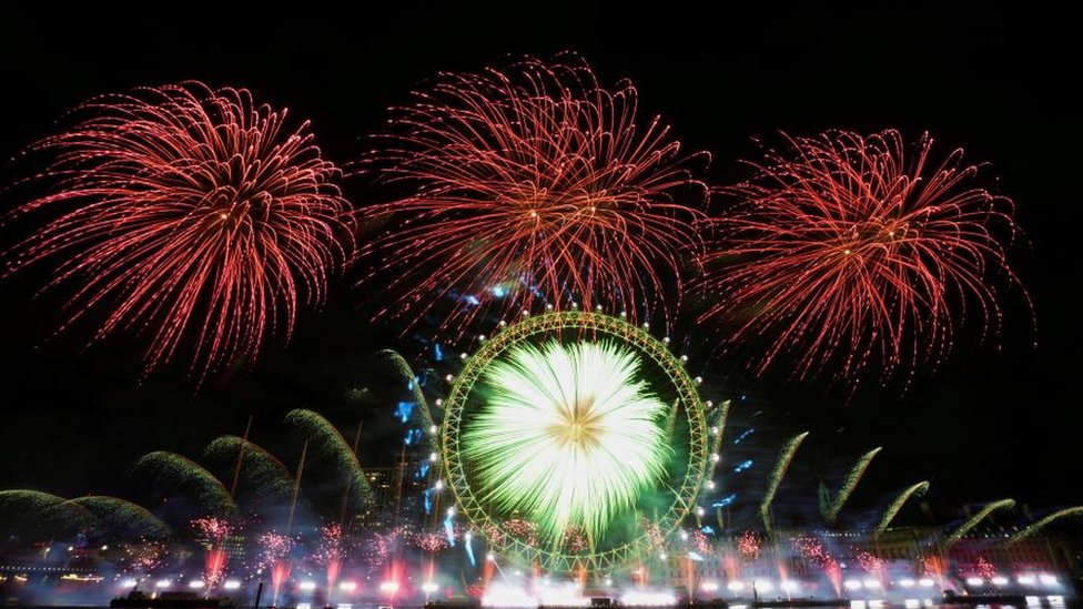 Fireworks explode over the London Eye ferris wheel as part of its celebrations
