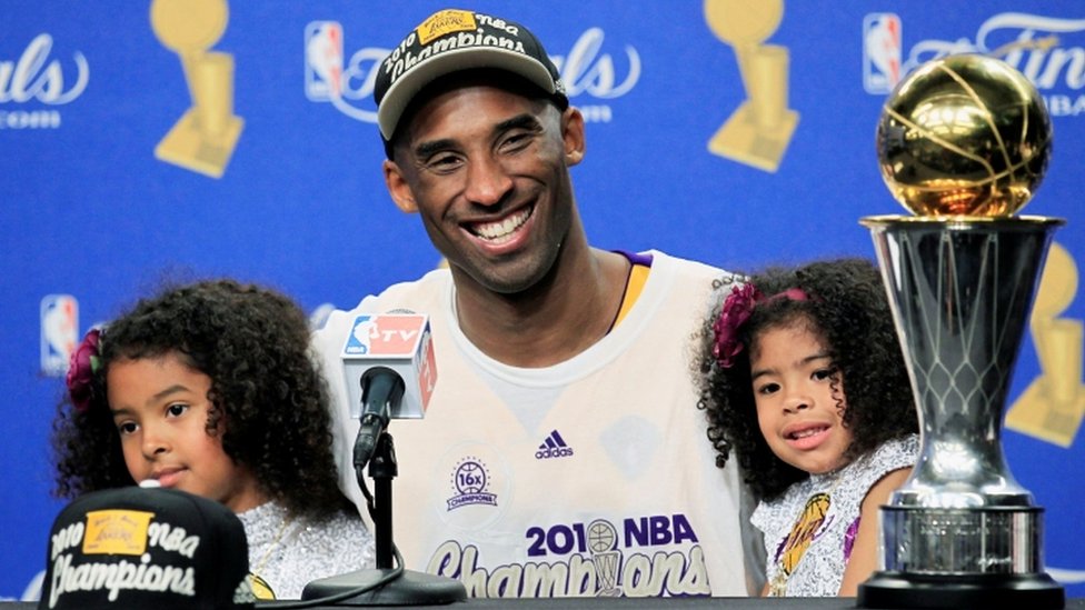 Kobe Bryant with daughters Gianna and Natalia after winning the 2010 NBA Finals basketball series in Los Angeles, California, in 2010