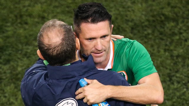 Robbie Keane is embraced by manager Martin O'Neill after playing his final Republic of Ireland game