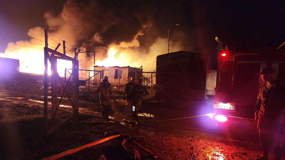 Rescue and medical personnel work following an explosion in the gas warehouse near the Stepanakert-Askera highway in Berkadzor on 26 September