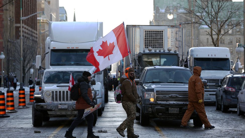 Supporters of the "Freedom Convoy" protesting against Covid-19 vaccine mandates and restrictions in front of the Parliament of Canada