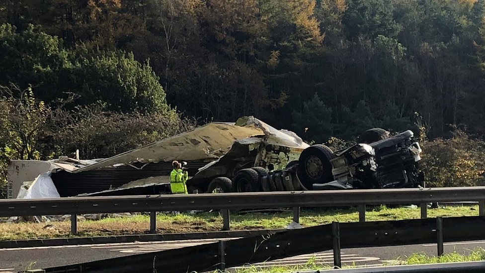 Driver killed after lorry crashes through flyover barrier near Perth