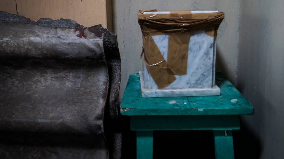 Marble urn containing human ashes