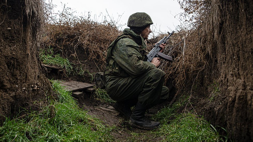 An officer of the People's Police of the Lugansk People's Republic is pictured near Slavyanoserbsk, east Ukraine