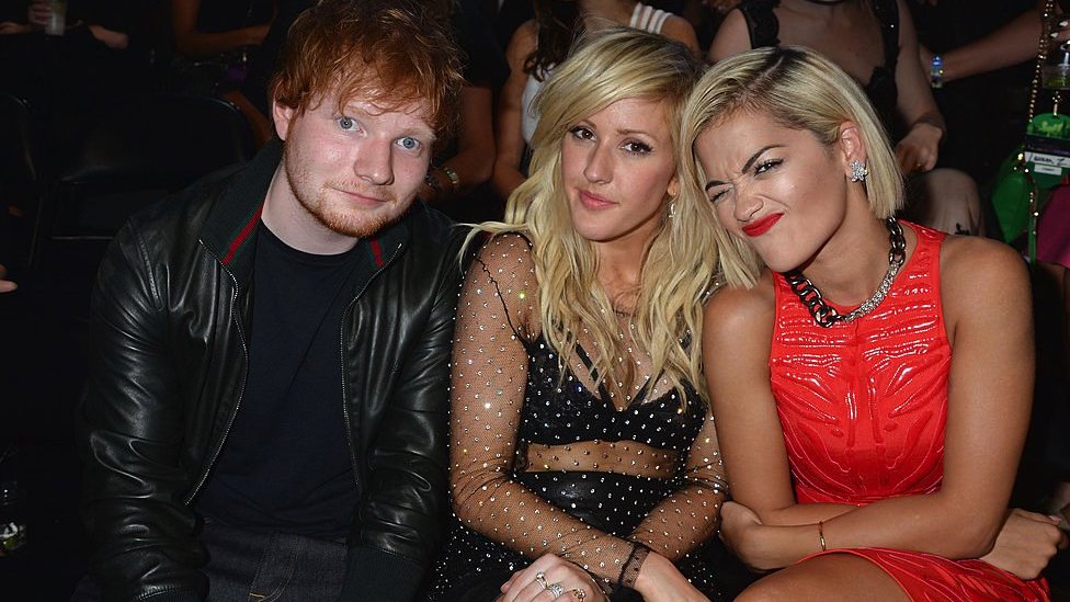 Ed Sheeran and Ellie Goulding (centre) with Rita Ora at an awards ceremony in 2013