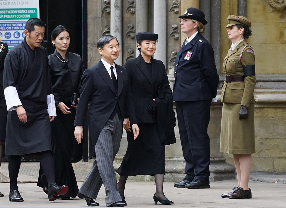 Emperor of Japan Naruhito (centre) and wife Empress Masako arrive at the State Funeral of Queen Elizabeth II, held at Westminster Abbey, London