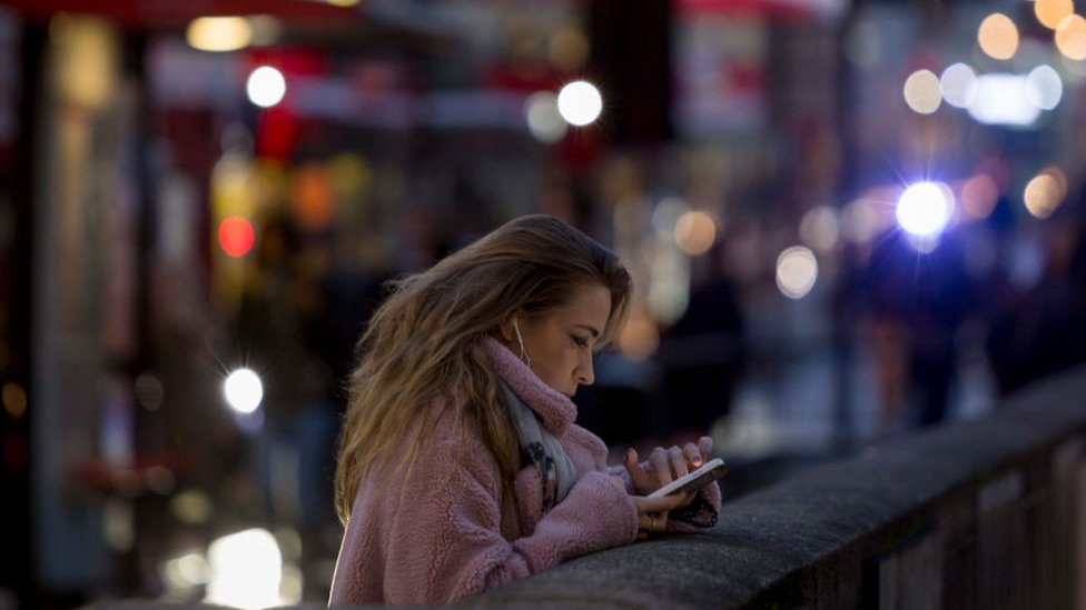 Woman looking at phone