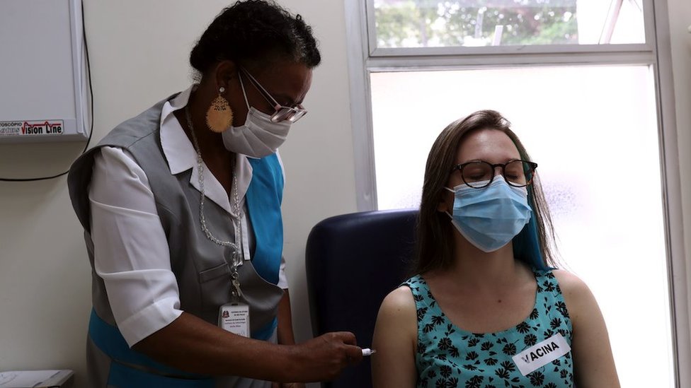 A volunteer is given a jab during the trial stage of the Coronavac, SinoVac's coronavirus disease (COVID-19) vaccine, at Emilio Ribas Institute in Sao Paulo, Brazil December 11, 2020.