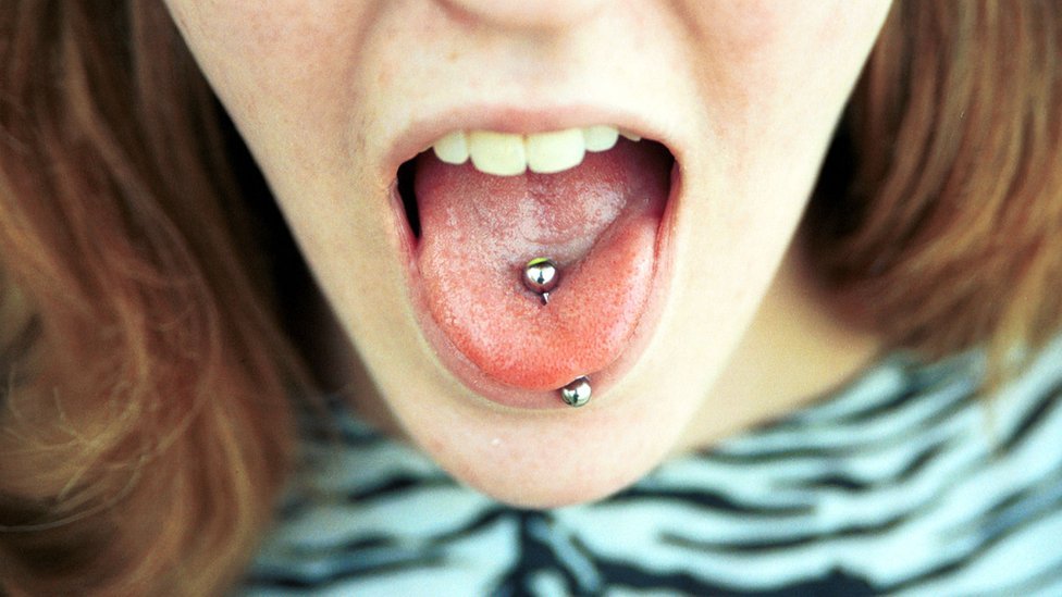 Ban on tongue piercing for under-18s. places that do tongue piercings. 