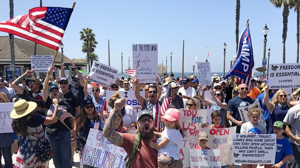 Image shows protesters converged on Huntington Beach in May