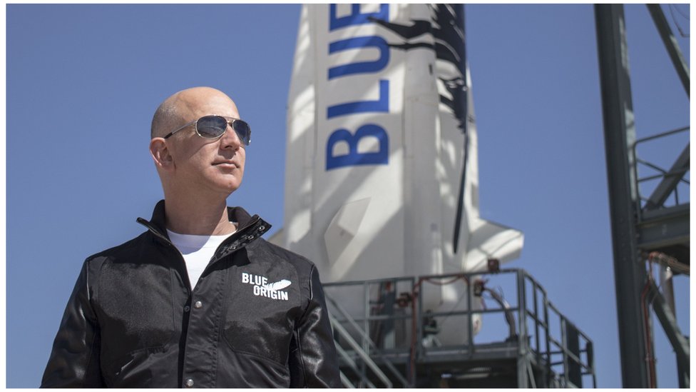 This April 24, 2015 handout photograph obtained courtesy of Blue Origin shows Jeff Bezos, founder of Blue Origin, at New Shepard"s West Texas launch facility before the rocket"s maiden voyage.