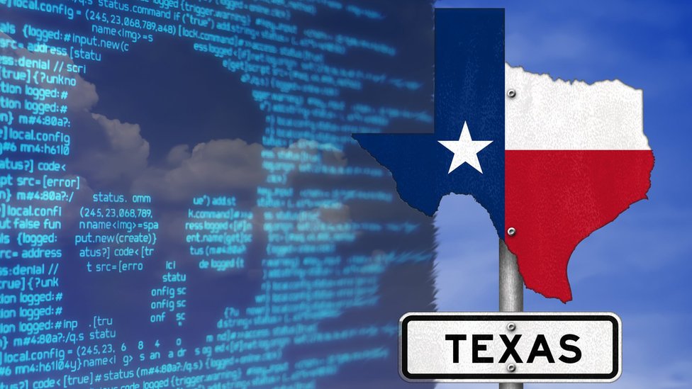 Экран с графикой вымогателей и флагом Техаса